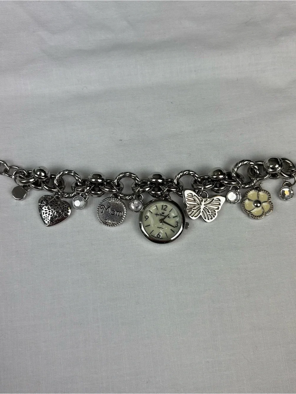 Hallmark Silver-Tone “Mom” Charm Bracelet Watch with Cream Flower